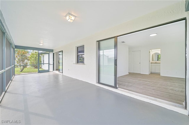 view of unfurnished sunroom