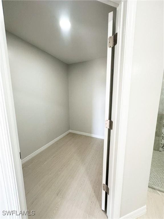 unfurnished room featuring light wood-type flooring