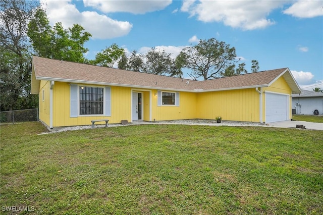 single story home featuring a front yard and a garage