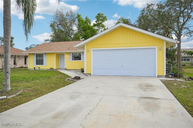 ranch-style house with a front yard and a garage