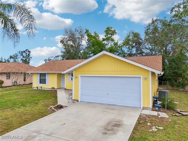 single story home featuring a front yard and a garage