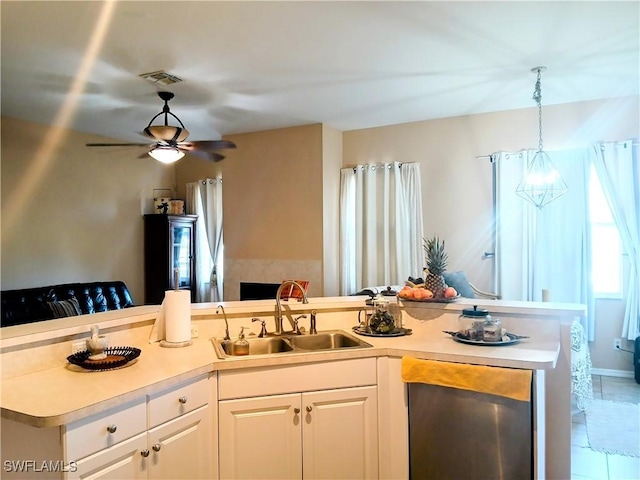 kitchen with white cabinetry, sink, ceiling fan, tile patterned flooring, and pendant lighting