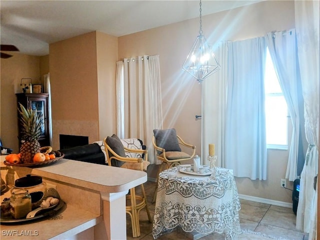 tiled dining room featuring a fireplace