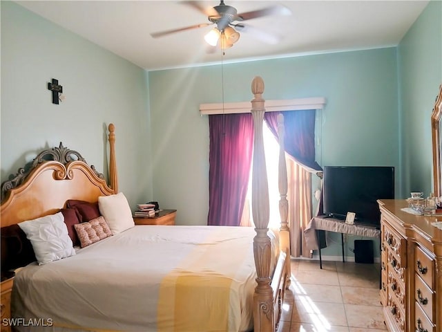 bedroom featuring ceiling fan and light tile patterned floors