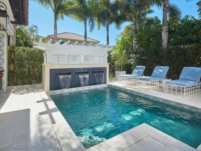 view of pool featuring a patio