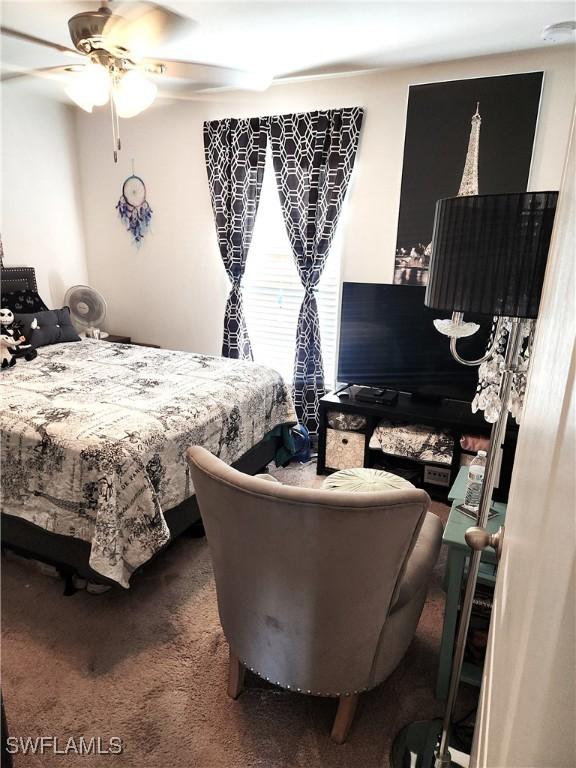 bedroom featuring carpet floors and ceiling fan