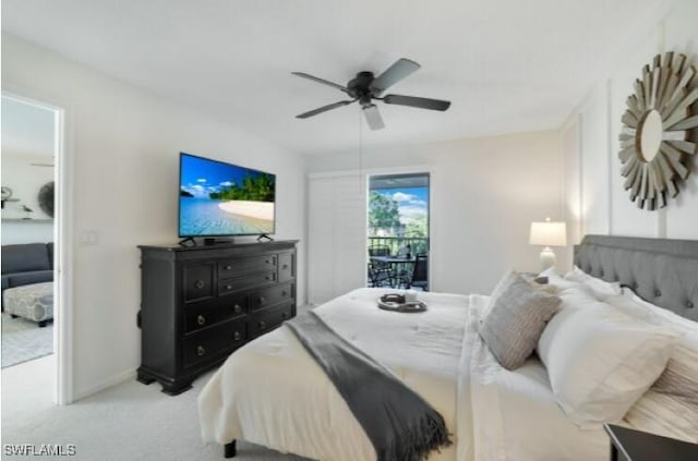 bedroom with access to exterior, ceiling fan, and light carpet