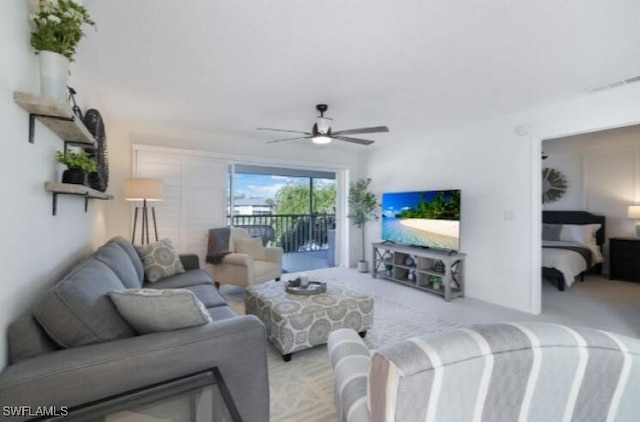 living room with ceiling fan