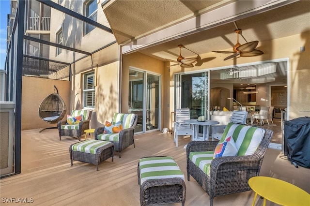 view of patio featuring ceiling fan