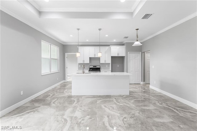 kitchen featuring white cabinetry, stainless steel range, sink, hanging light fixtures, and an island with sink