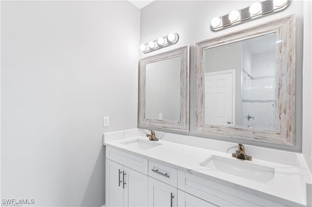 bathroom featuring vanity and walk in shower