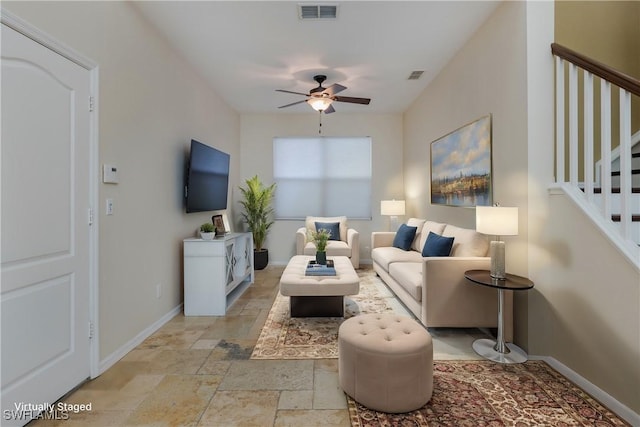 living room with ceiling fan