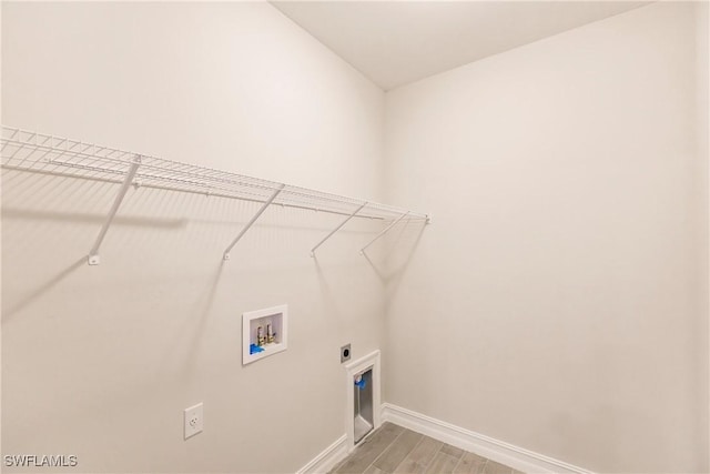 laundry area with washer hookup and hookup for an electric dryer