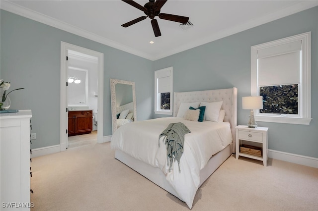 carpeted bedroom with ceiling fan, crown molding, and connected bathroom