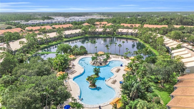 birds eye view of property featuring a water view