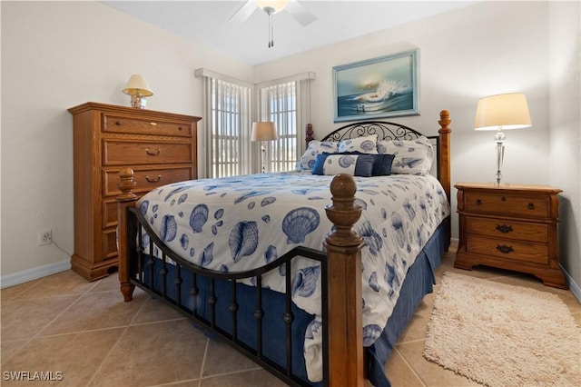 bedroom featuring ceiling fan and light tile patterned floors