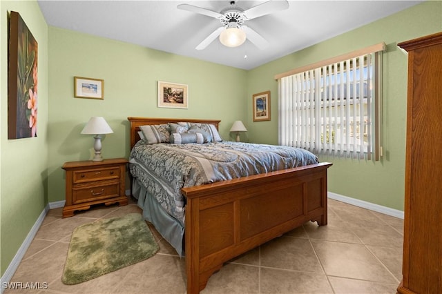 bedroom featuring ceiling fan and light tile patterned floors