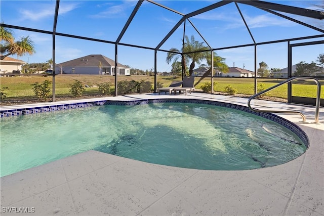 view of swimming pool featuring glass enclosure and a patio area