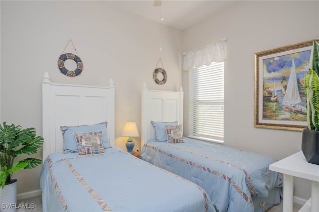 bedroom featuring ceiling fan and carpet floors