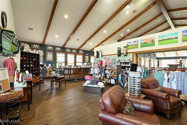 living room with hardwood / wood-style flooring and lofted ceiling with beams