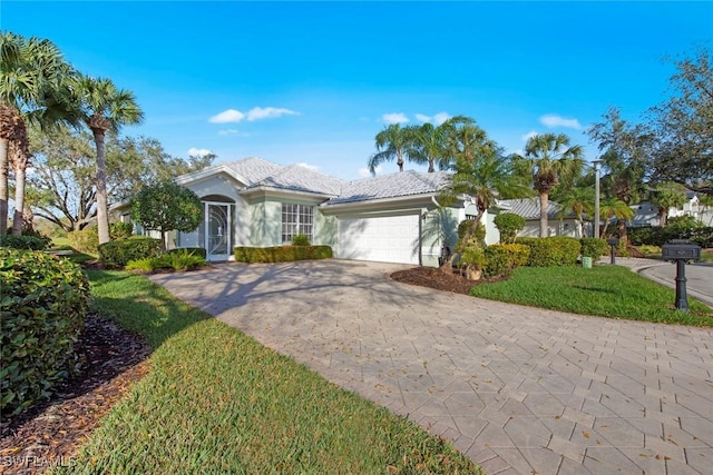 view of front of home with a garage