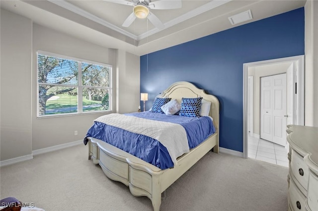 bedroom with ceiling fan, light colored carpet, and ornamental molding