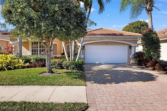 view of front of property with a garage