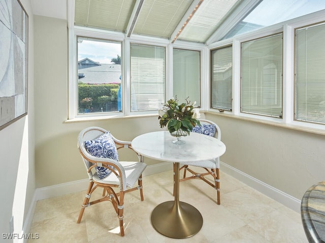 sunroom with vaulted ceiling