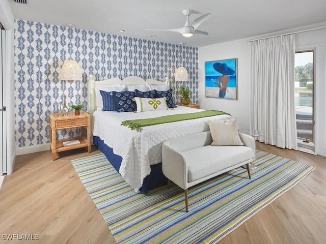 bedroom featuring ceiling fan and wood-type flooring