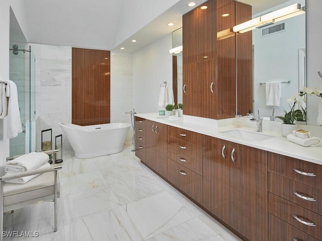 bathroom featuring plus walk in shower, vanity, and lofted ceiling