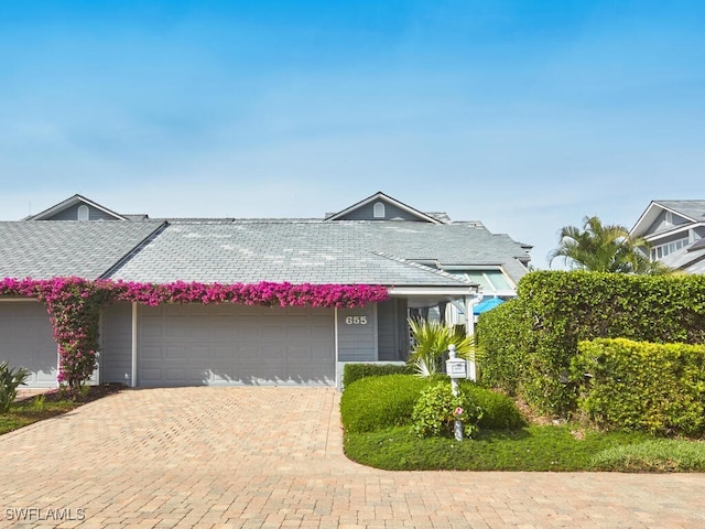 view of front of property with a garage