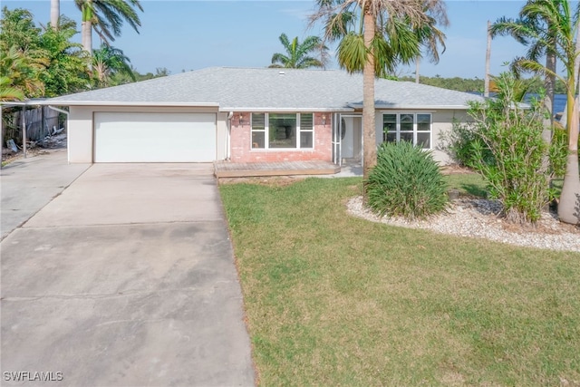 ranch-style house with a front lawn and a garage