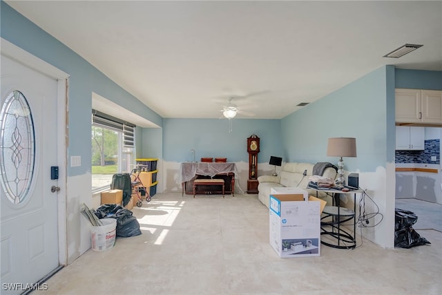 living room featuring ceiling fan