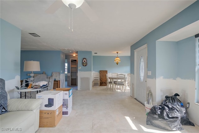 living room featuring ceiling fan