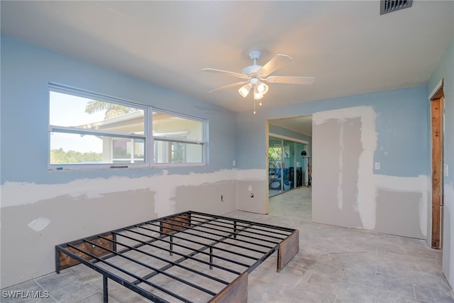 spare room featuring ceiling fan