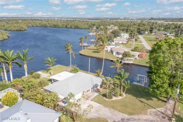 drone / aerial view with a water view