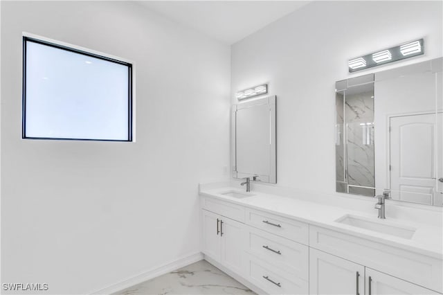 bathroom featuring a shower and vanity