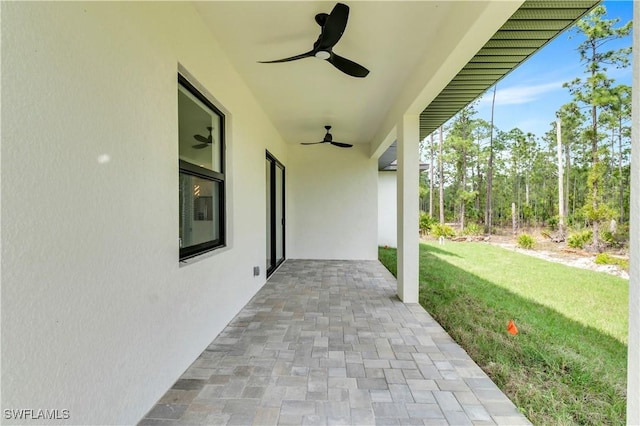 view of patio with ceiling fan