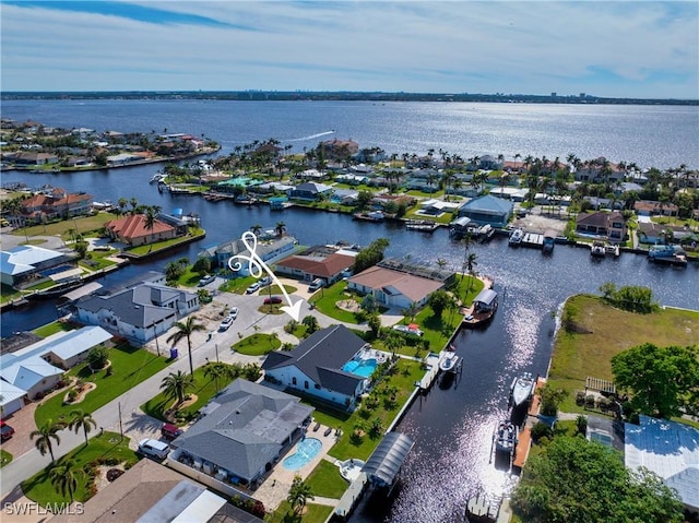 drone / aerial view featuring a water view