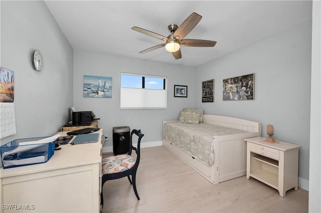 bedroom featuring ceiling fan and light hardwood / wood-style floors