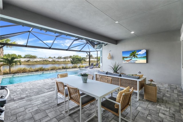 view of patio featuring glass enclosure, outdoor lounge area, an outdoor pool, and outdoor dining area