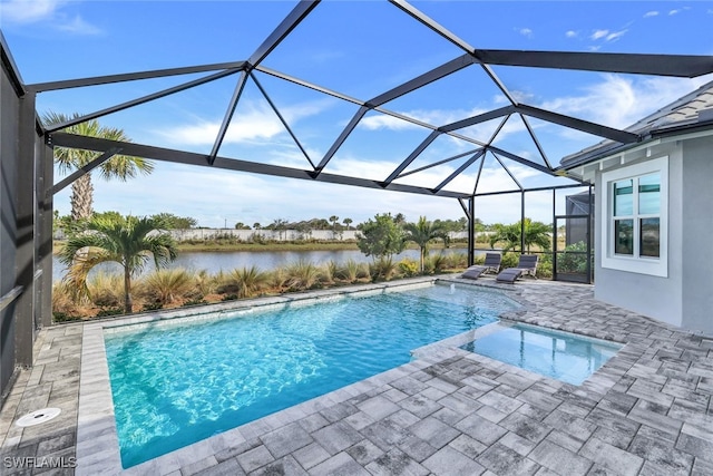 pool with a patio area, a water view, and a lanai