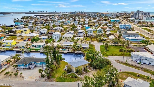 aerial view featuring a water view and a city view