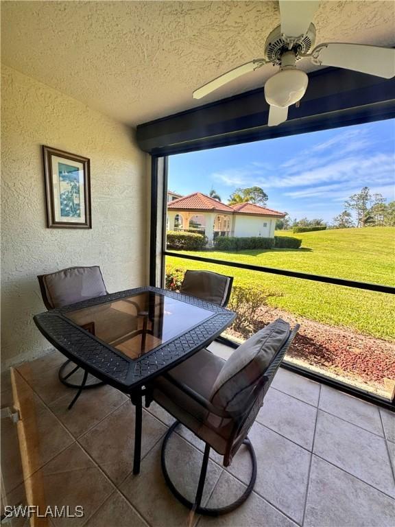 interior space featuring ceiling fan