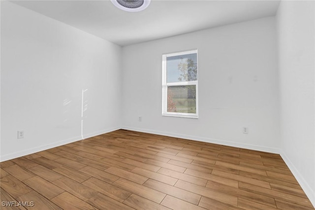 empty room featuring light hardwood / wood-style floors