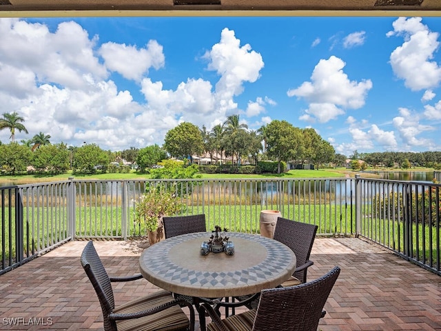 view of patio featuring a water view