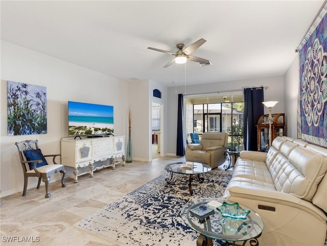 living room with ceiling fan