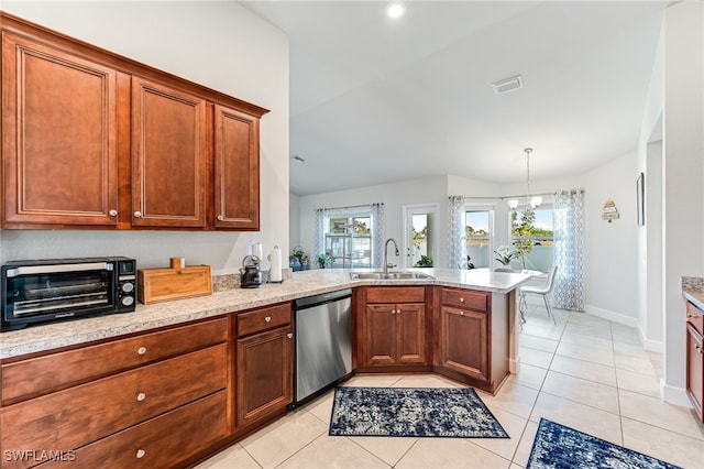 kitchen with stainless steel dishwasher, hanging light fixtures, lofted ceiling, and sink