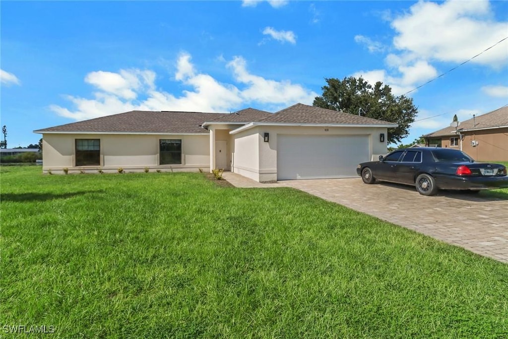 single story home with a front lawn and a garage