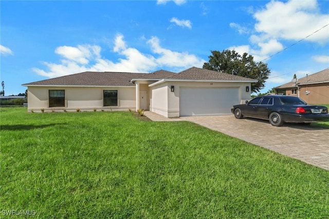 single story home with a front lawn and a garage